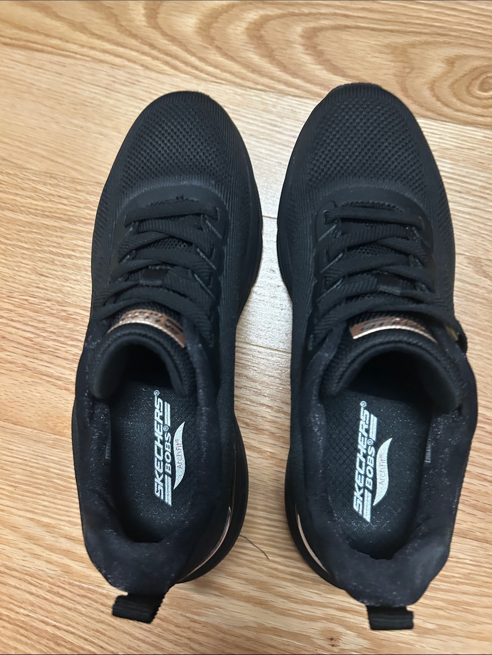 Skechers Men’s Black Athletic Trainers with Subtle Rose Gold Accents